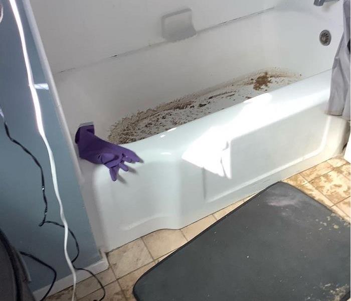 Bath tub and tile flooring with sewage water